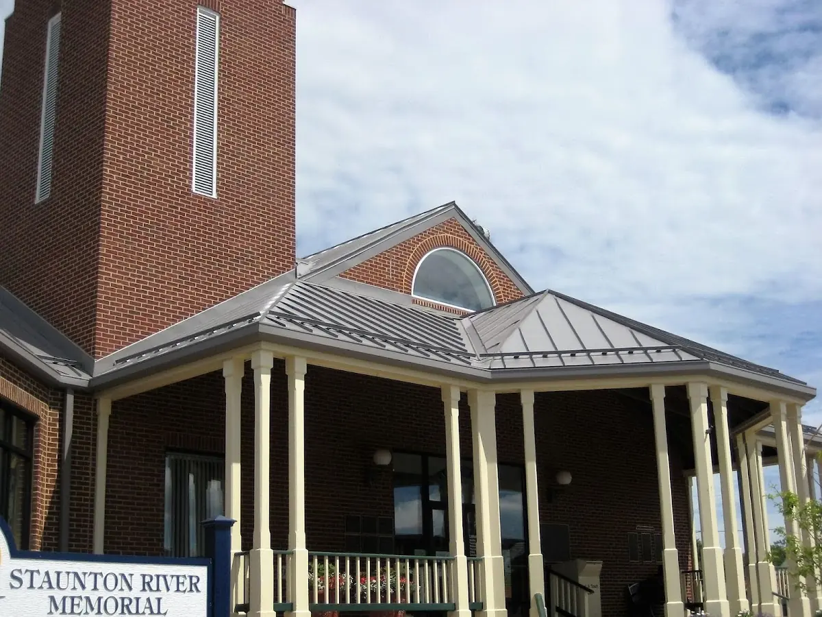 Skilled roofing craftsmen working on a residential roof in Nonconnah